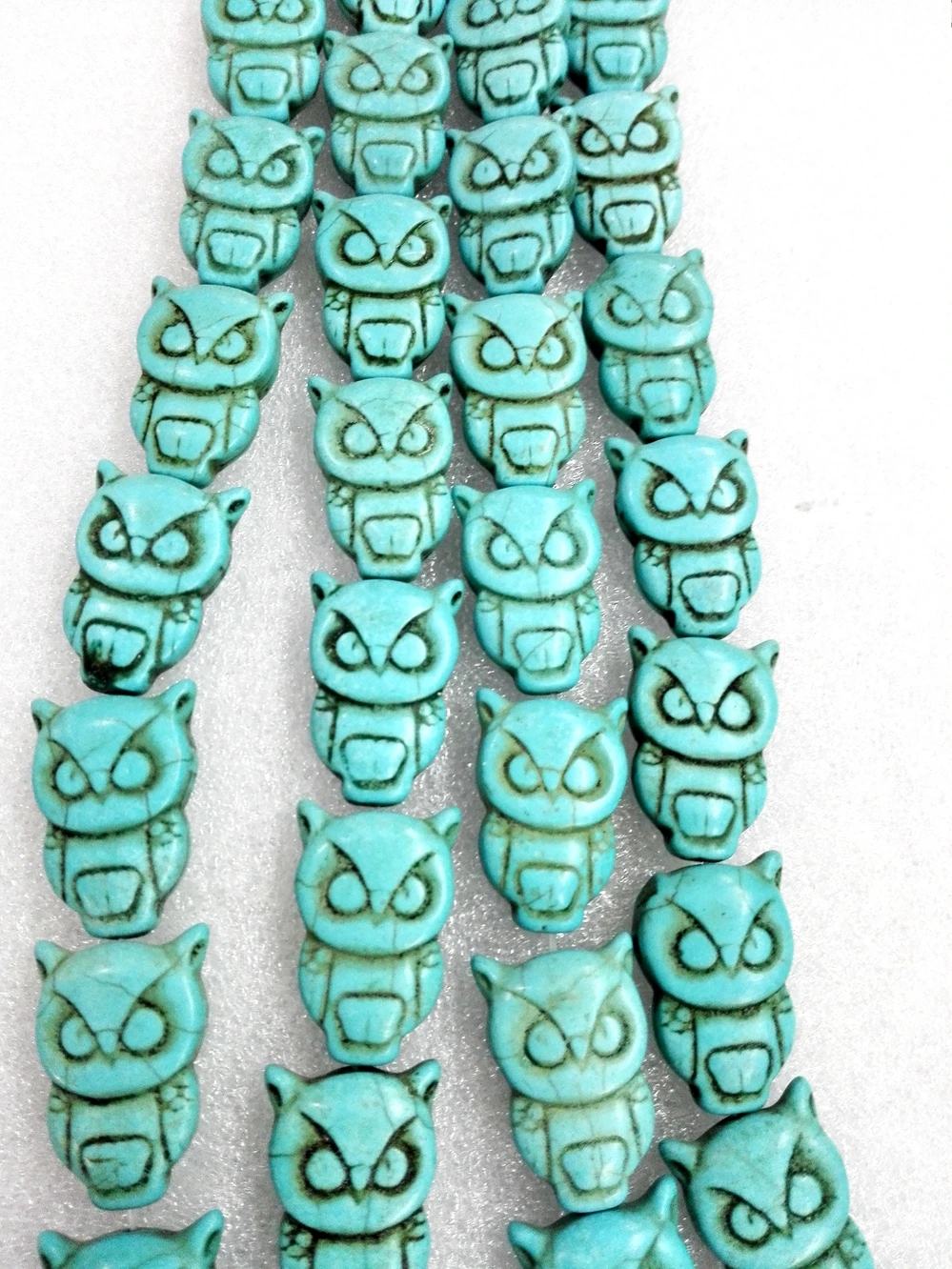 

Total 13 pcs beads 32x20mm carved owl animal Bright light blue howlite stone Loose Beads