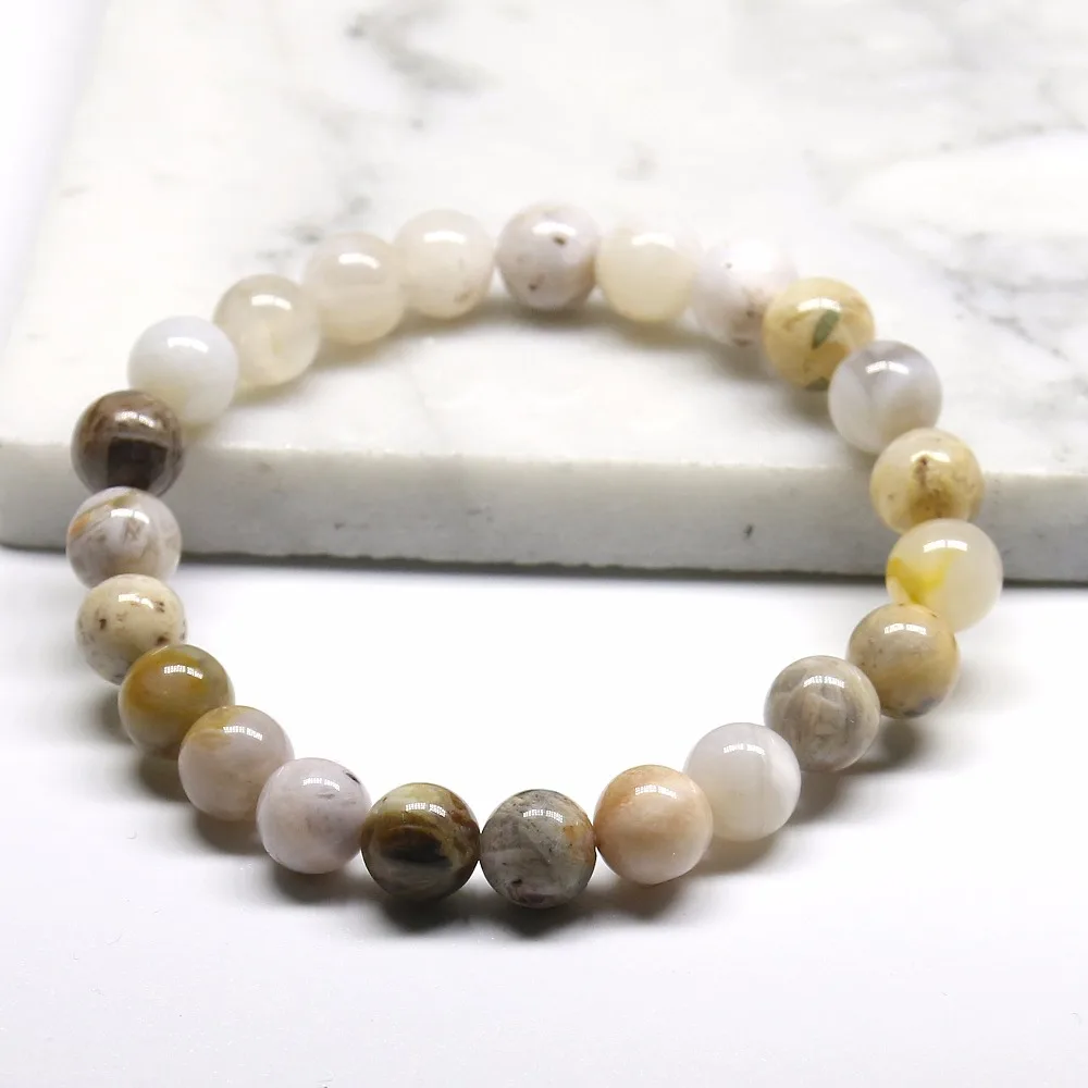 Женский браслет из ониксовых бусин натурального пресноводного солнечного камня