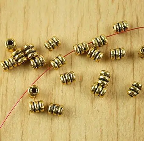 

dark gold-tone and tibetan silver color to choose spiral tube spacer beads 100pcs lot