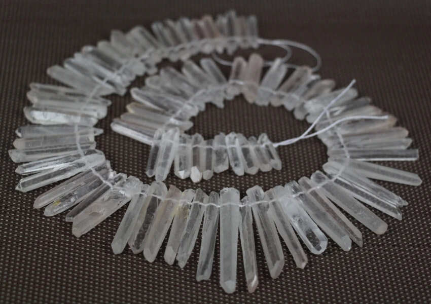 

Full Strand of AAA-Grade Raw Clear Crystal Pillar Top Drilled Pendant Beads,Rock Crystal Quartz Graduated Tusk Stick Point beads