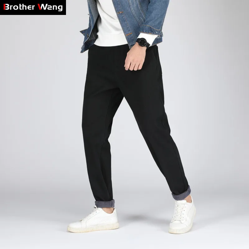 Мужские повседневные утепленные брюки однотонные облегающие эластичные большие