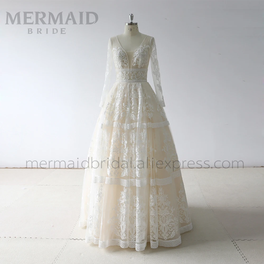 

Backless Long Sleeve Lace Wedding Dress