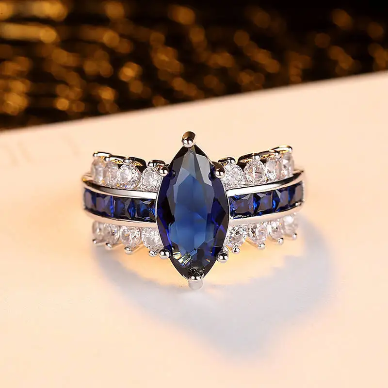 Кольцо Dovolov с цирконием в форме конского глаза подарок голубым камнем