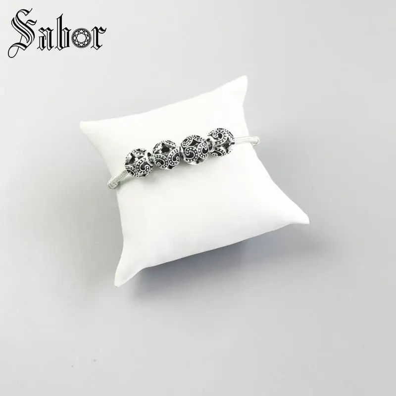 Посеребренные черные мощные волнистые бусины самые модные самодельные из кармы