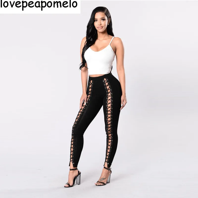 Женские повседневные леггинсы на шнуровке черные с дырками в стиле панк модель