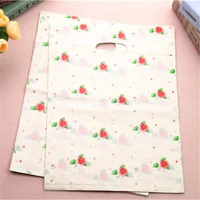 2021 new design wholesale 100pcslot 3040cm large shopping package bags with flowers plastic clothing packaging bags