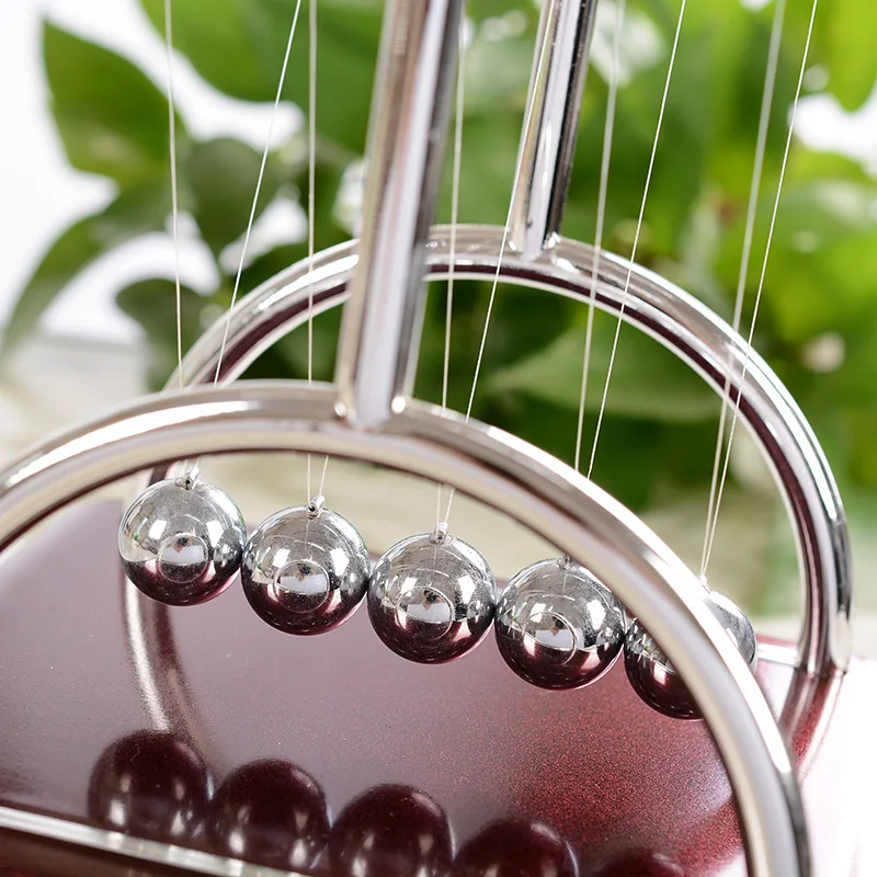 Физика маятниковый баланс удар мяча эксперимент Колыбель Ньютона биллиардный