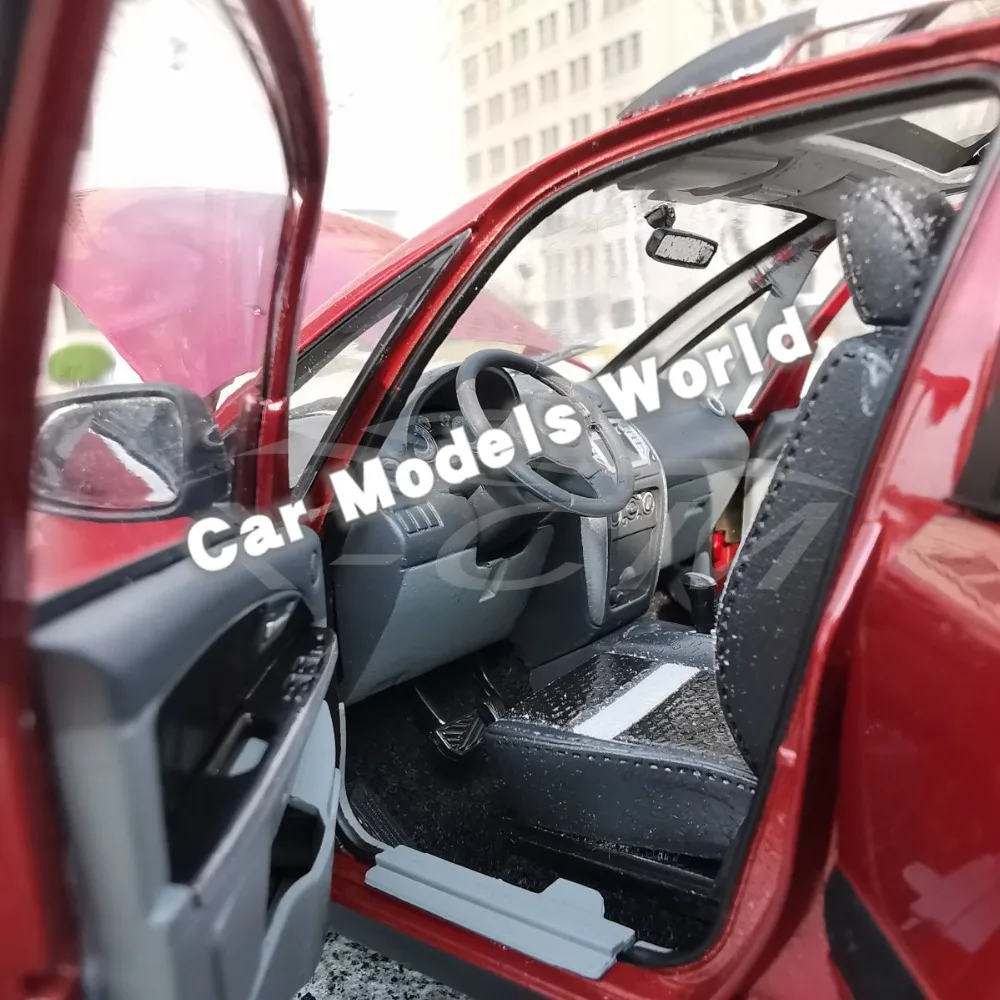 Модель литая автомобиля для кроссовера SX4 (оранжево красный) 1:18 + небольшой