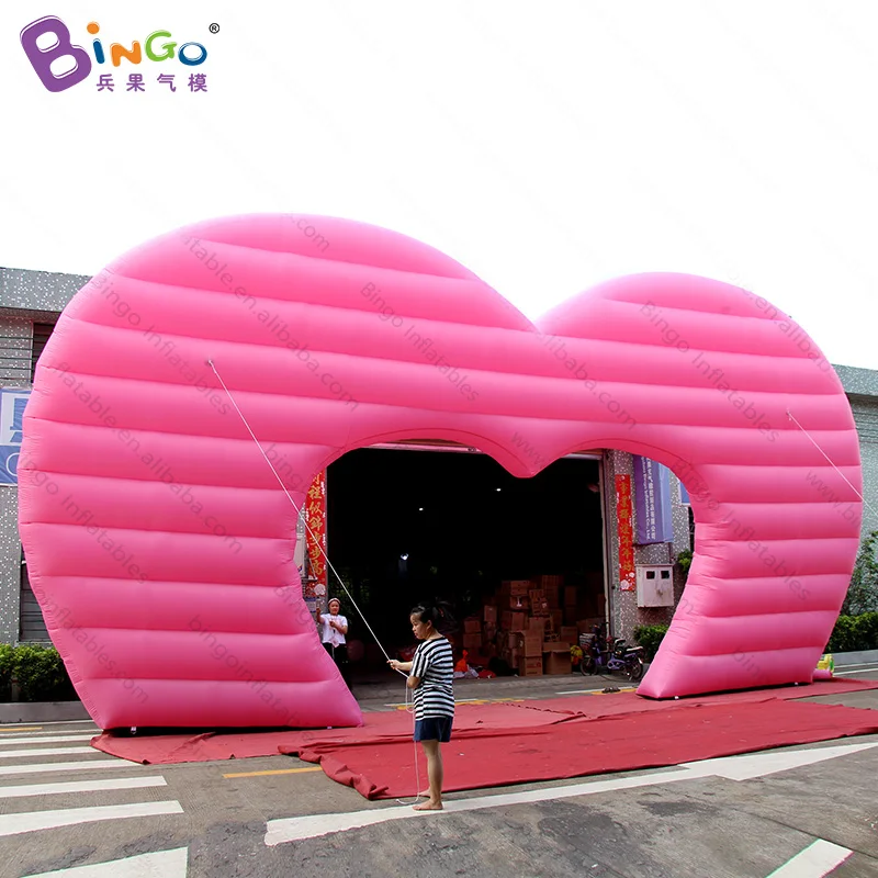 

Customized 12X7 meters valentines inflatables heart arch promotional pink heart airblown archway with motor toys