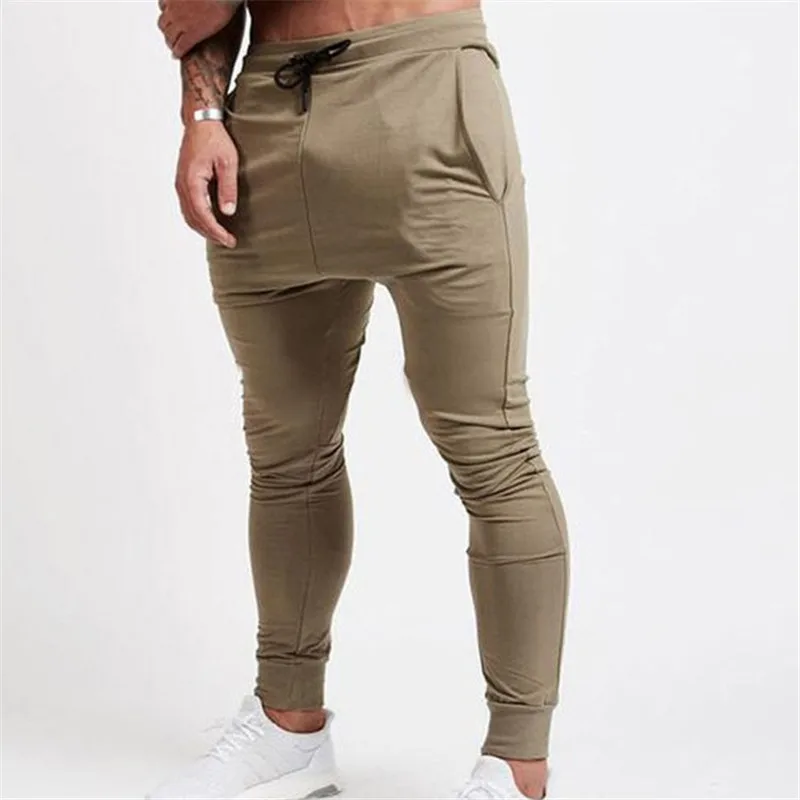 Khaki Мужские повседневные брюки для пробежек Фитнес Мужская спортивная одежда нижняя часть спортивного костюма узкие спортивные Штаны брюки черные тренажеры беговая дорожка Штаны - Цвет: Khaki