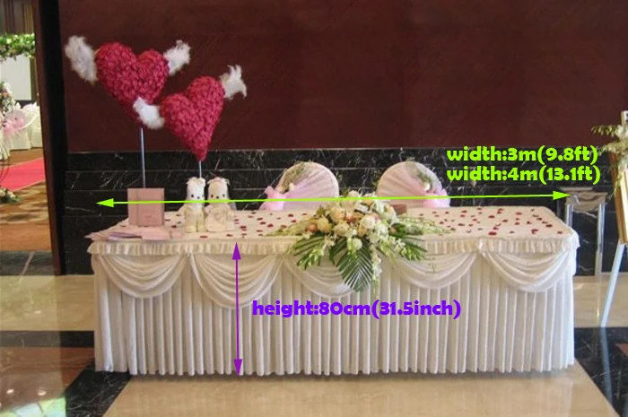 

white table skirt wedding table decoration
