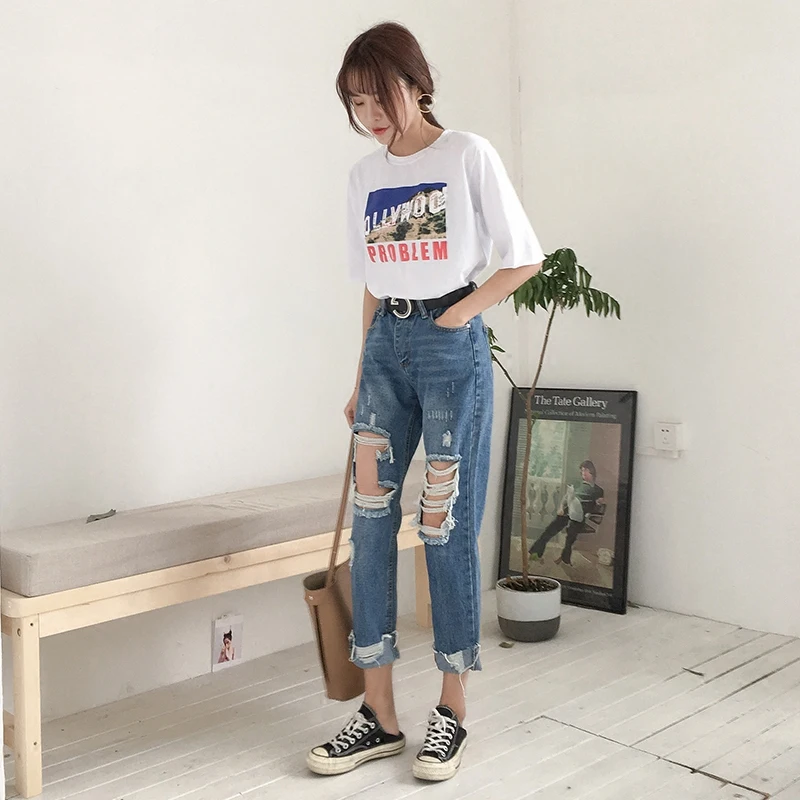 Джинсы с большими дырами до колена женские штаны 9 точками тонкие брюки высокой