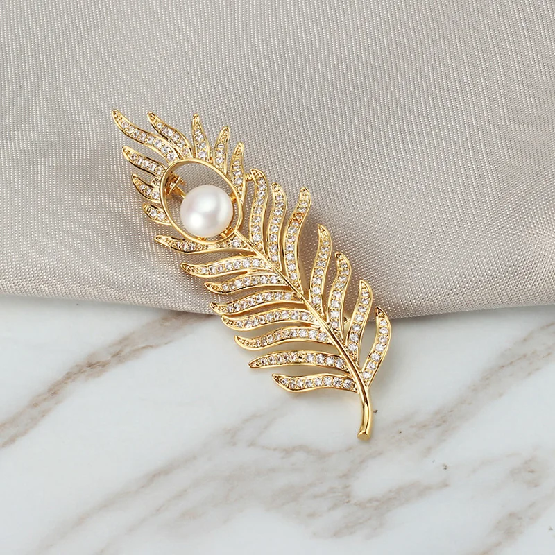 

Luxury Crystal Gold Leaf Styple Brooches Women Natural Pearl Brooch Pins Jewelry for Wedding Scarf Rhinestone Pins Accessories