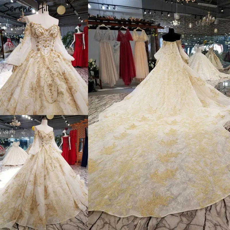 Свадебное платье принцессы расшитое бисером с длинными рукавами открытыми