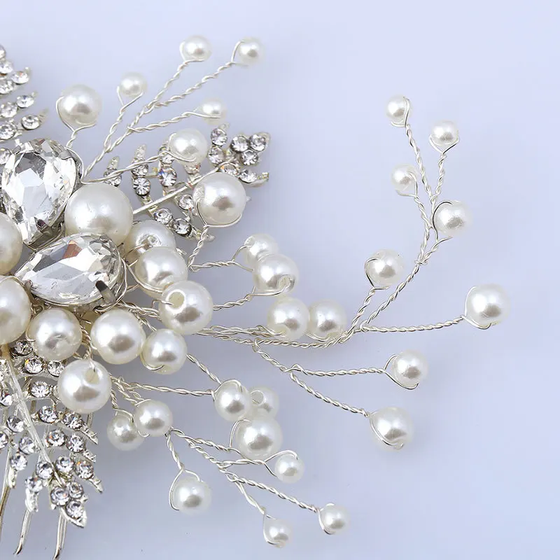 

The new bride inserts her hair and combs her pearls by hand.