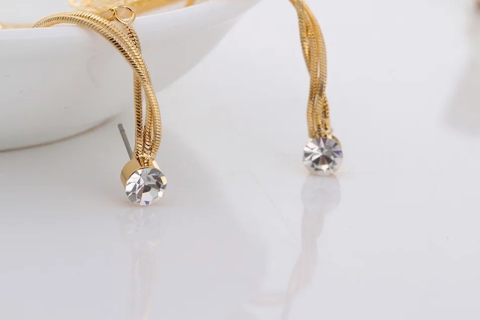 Женские серьги подвески с цепочкой висячие из трех филигранных листьев длинной