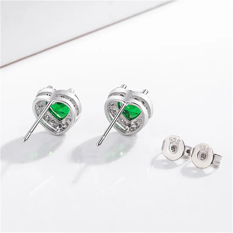 Изысканные серебряные серьги с кристаллами красного зеленого цвета цирконием