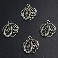 wkoud 8pcs silver plated hollow rope knot alloy pendants fashion earrings bracelet diy metal jewelry charm display a1295