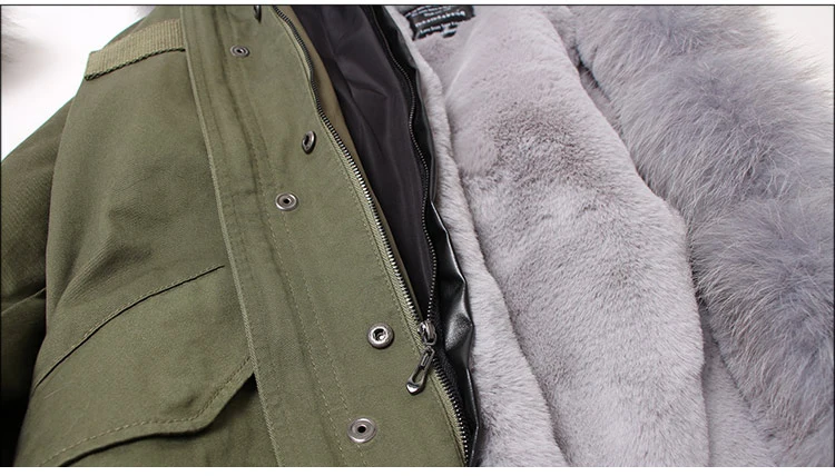 Женская парка на искусственном меху зеленая с воротником из натурального