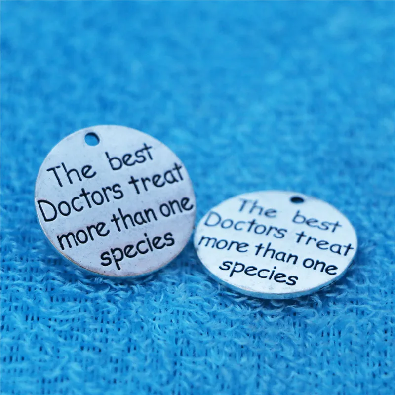 

Top Quality 10 Pieces/lot 23mm Letter Engraved The best doctors treat more than species charm family charms word charms for diy