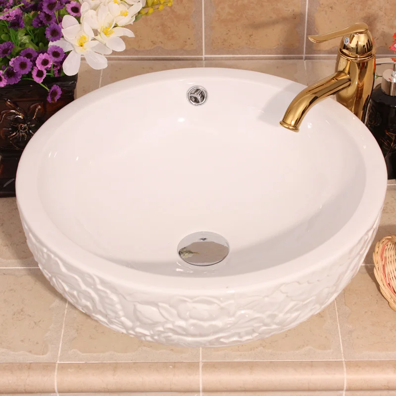 Jingdezhen Ceramic Art basin carved white lotus double bathroom counter washbasin with overflow |