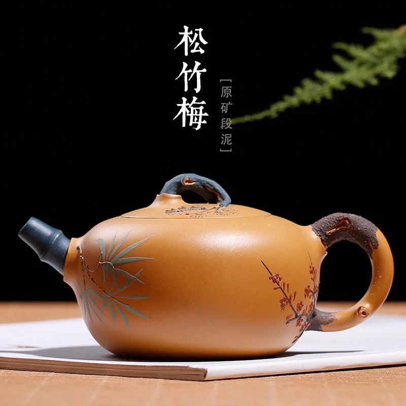 

Yixing Purple Sand Pot Gold Section Mud Zhu Hongjun Handmade Famous Teapot with Pine, Bamboo and Plum Flower