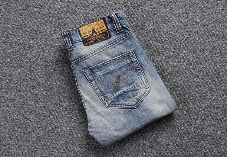 Мужские рваные джинсы синие зауженные с вышивкой классический винтажный - Фото №1
