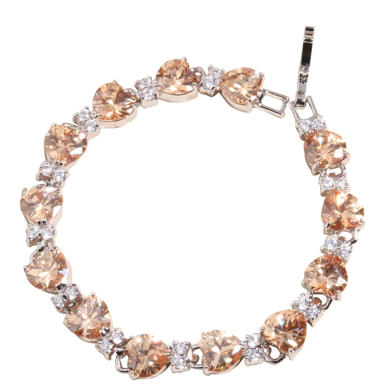 Браслет цепочка цвета шампанского с сердцем оранжевым морганитом и серебряным