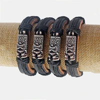 wholesale 12pcs black leather white tiki man charm bracelets