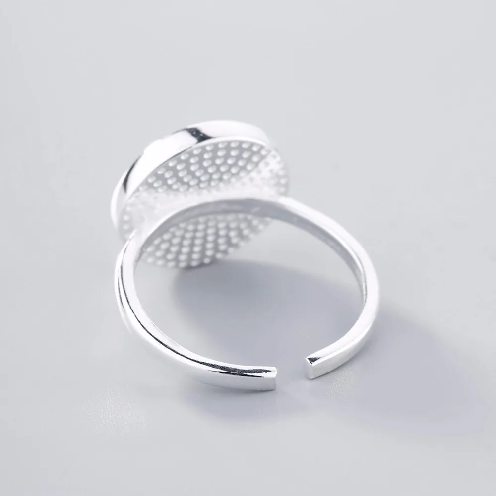Женское кольцо Cxwind Черное и белое регулируемое с круглым мраморным камнем