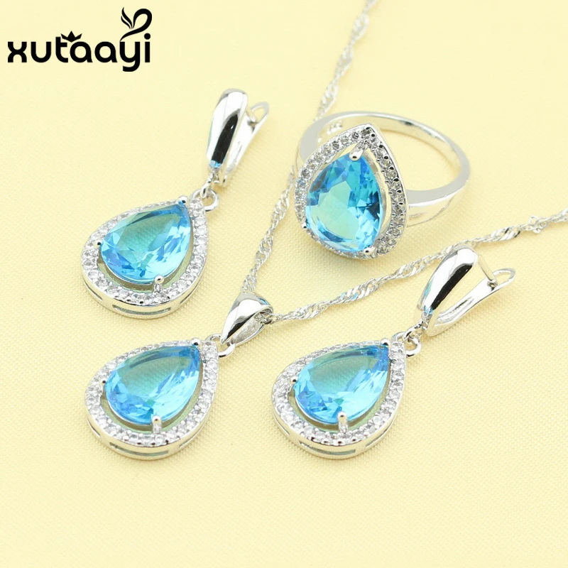 Красивый набор серебряных ювелирных изделий с голубым Цирконом в форме капли