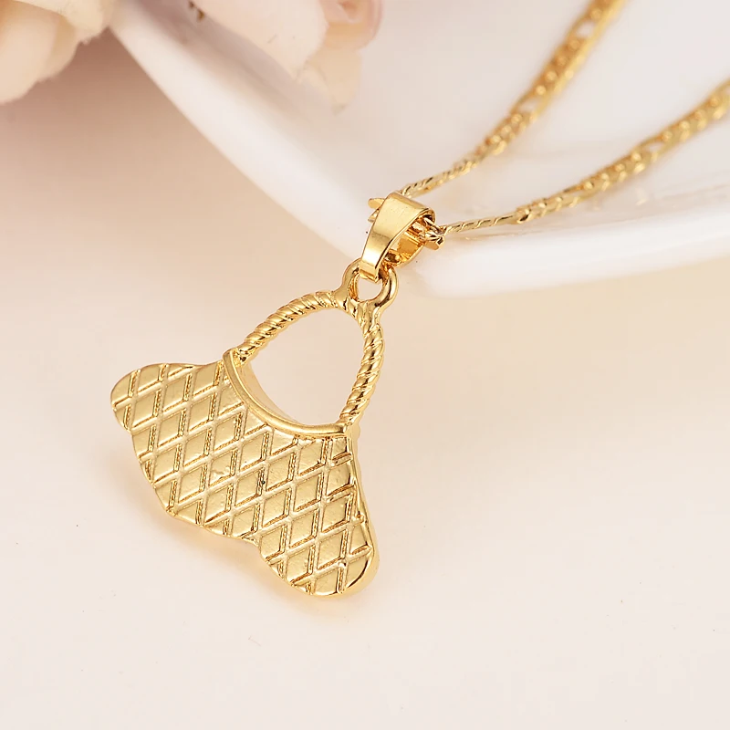 Женский комплект с подвеской и кольцом золотистого цвета в форме сумки