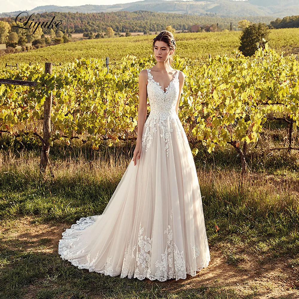 

Liyuke Embroidery Lace Of A-Line Wedding Dress New Arrival With Sleeveless V-neck Wedding Gown