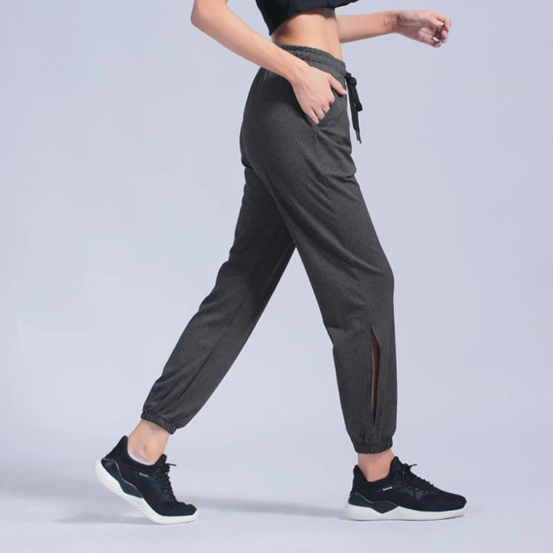 Тонкие спортивные штаны женские свободные для йоги тренировок фитнеса стрейч