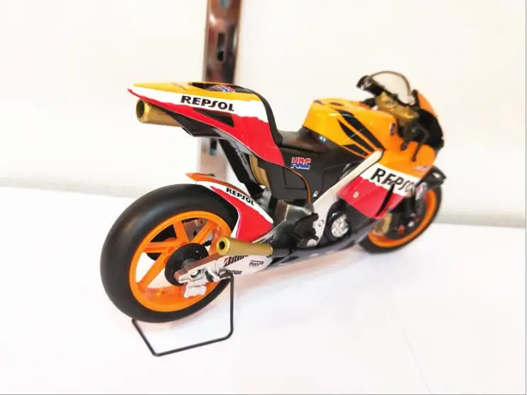 GP трек версия мотоцикла Тяньцзинь модель 4 литая машины RC211V HONDA2006 оранжевый 1/12 |