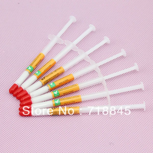 50PCS Lot White Syringe LED IC CPU VGA Xbox360 Heaksink Compounds Thermal Paste