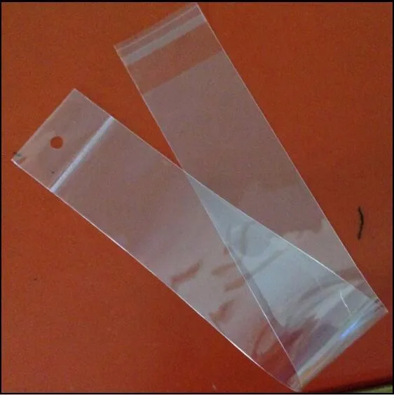 

7 sizes Long Clear Cellophane/BOPP/Poly Bags 10x60cm Long Transparent Opp cosmetic Bag Packing Plastic Bags Self Adhesive Seal