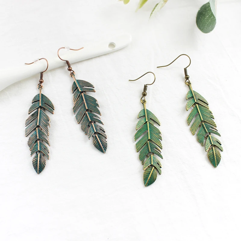 Серьги в форме листика разбивающие листья вшитые полный комплект винтажные