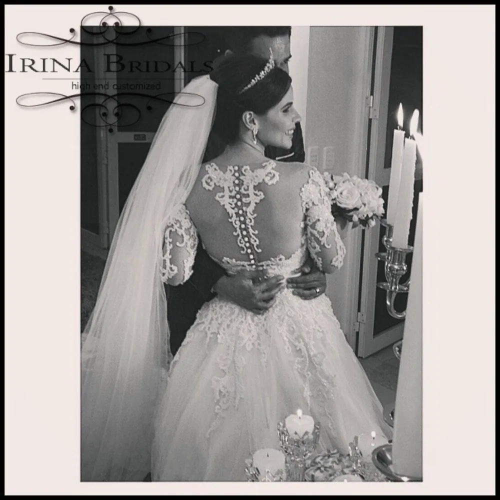 Свадебное платье с длинными рукавами и кружевной аппликацией в бразильском