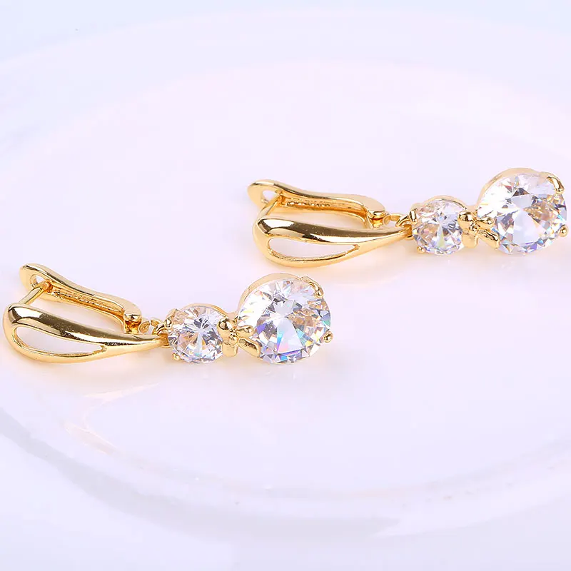 Женские серьги обручи с бантом и фианитом ER0122|fashion hoop earrings|hoop earringscz earrings |