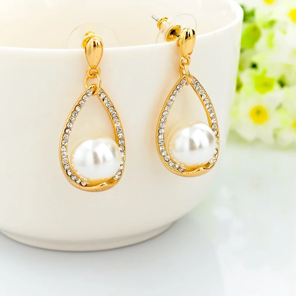 Женские серьги с искусственным жемчугом Szelam круглые золотистого цвета ювелирные