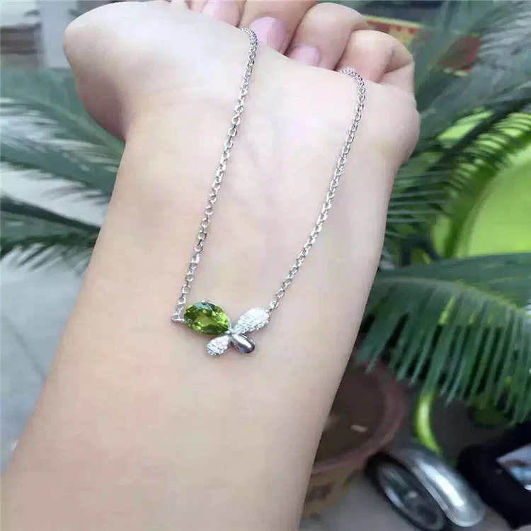 

KJJEAXCMY boutique jewels S925 pure silver inlaid bowknot natural olivine pendant clavicular chain