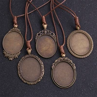 1pcs zinc alloy antique bronze 3040mm oval cabochon settings blank cameo pendant base tray with leather cord for jewelry making