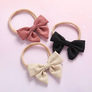 Однотонные нейлоновые повязки на голову с милым бантом для маленьких девочек, мягкие эластичные аксессуары для волос, хлопковые и льняные тканевые повязки на голову