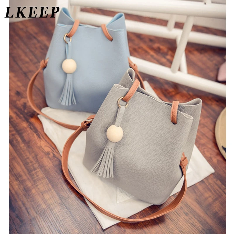 Дизайнерская женская сумка с кисточками и завязками сумки на плечо из