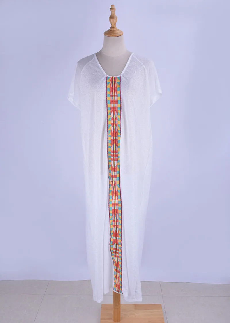 

The new Dailun Embroidery Beach Skirt, a loose, large holiday dress, a bathing suit, and a suntan shirt.