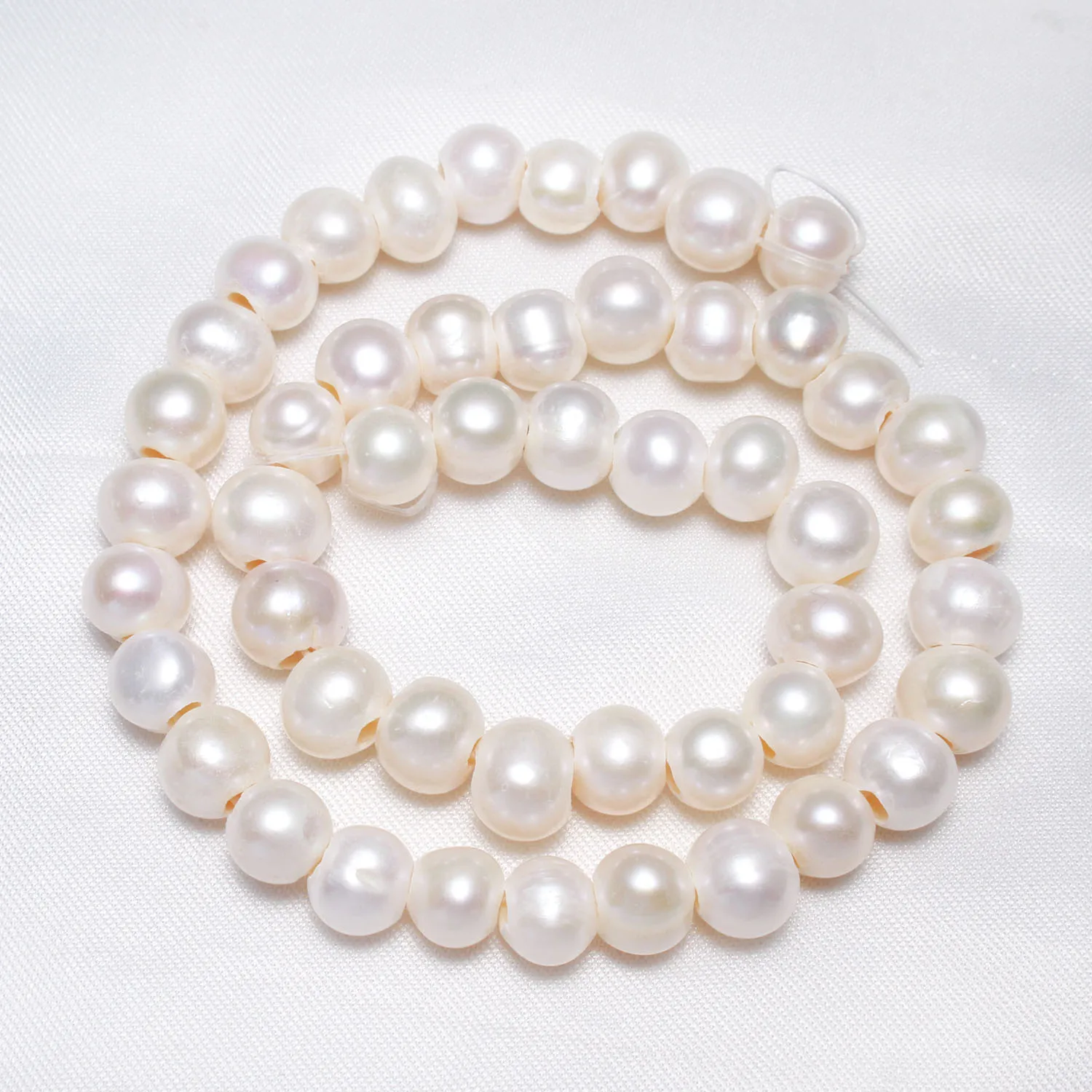 

Cultured Potato Freshwater Pearl Beads Natural 10-11mm Approx 3mm Sold By Strand