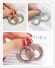 Женские серьги-кольца со стразами, серебро 925 пробы