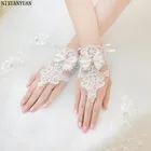 Элегантные Свадебные перчатки NIXUANYUAN цвета слоновой кости и белого цвета, перчатки с бисером и бисером, тонкие свадебные перчатки, свадебные аксессуары с бантом