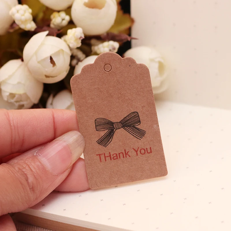 

100Pcs/lot 3*5 cm Shell Head kraft Print Bow paper hang tags/gift decorated card/baking price tags/gift tags/labels